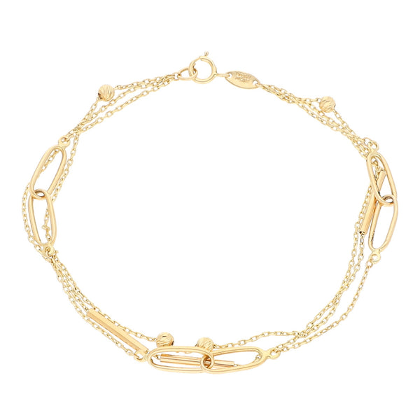 Pulsera de tres hilos eslabón combinado con aplicaciones en oro amarillo 14 kilates.
