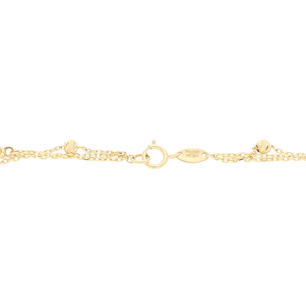 Pulsera de tres hilos eslabón combinado con aplicaciones en oro amarillo 14 kilates.