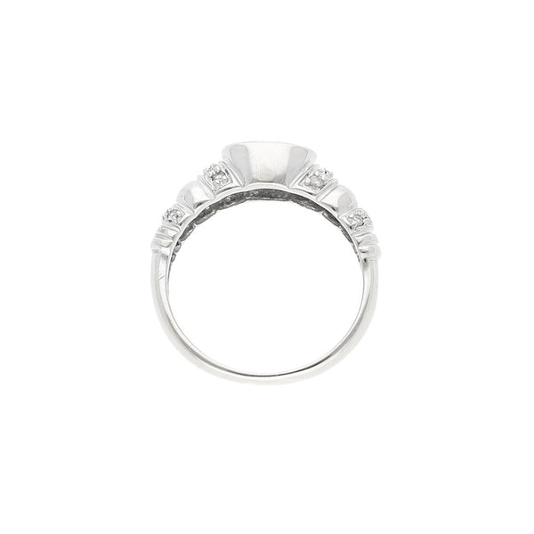 Anillo diseño especial con diamantes y sintéticos en oro blanco 14 kilates.