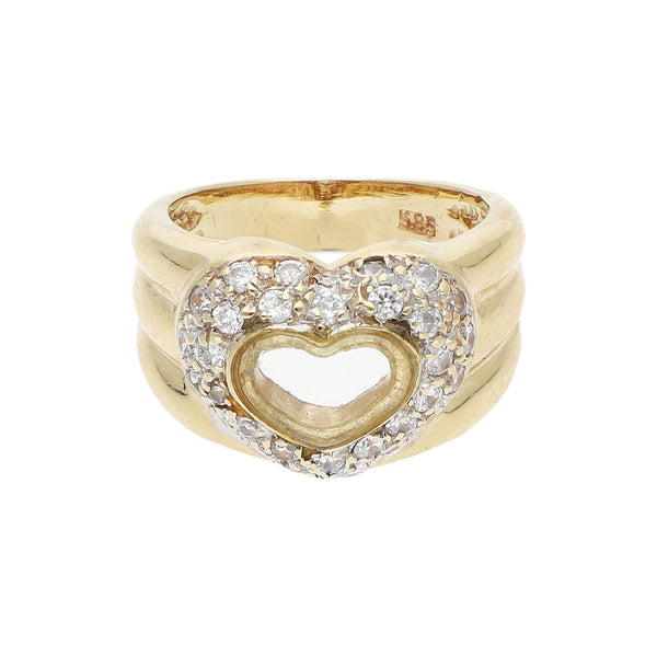 Anillo diseño especial motivo corazón con sintéticos y acrílico en oro amarillo 14 kilates.