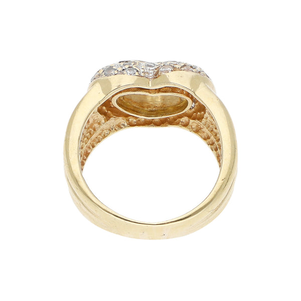 Anillo diseño especial motivo corazón con sintéticos y acrílico en oro amarillo 14 kilates.