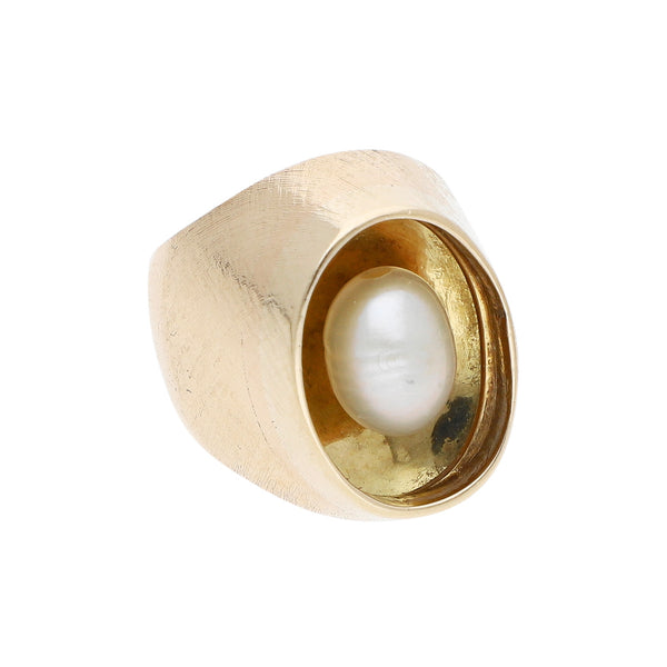 Anillo diseño especial con perla en oro amarillo 12 kilates.