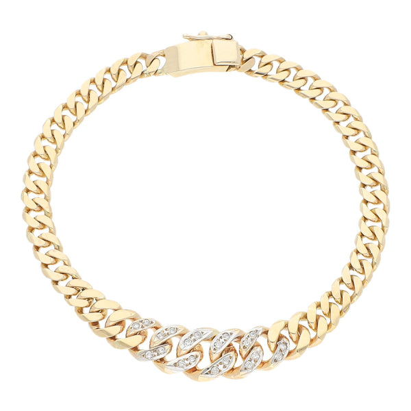 Pulsera eslabón barbado con diamantes en oro amarillo 14 kilates.