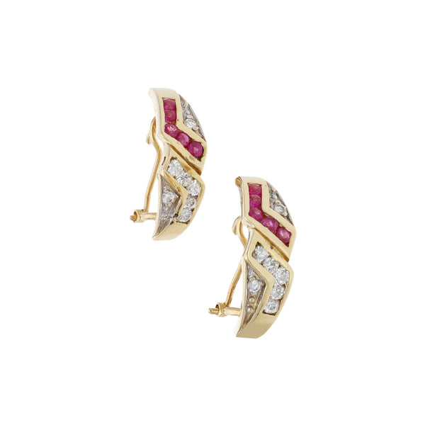 Aretes estilizados con sintéticos en oro amarillo 14 kilates.