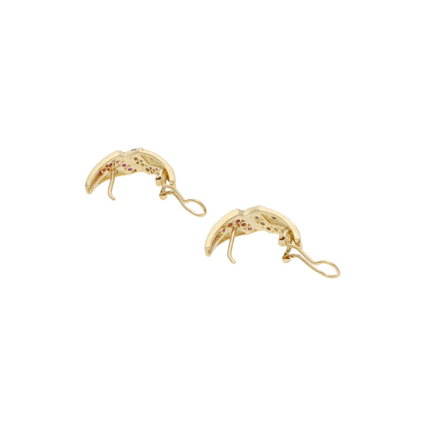 Aretes estilizados con sintéticos en oro amarillo 14 kilates.