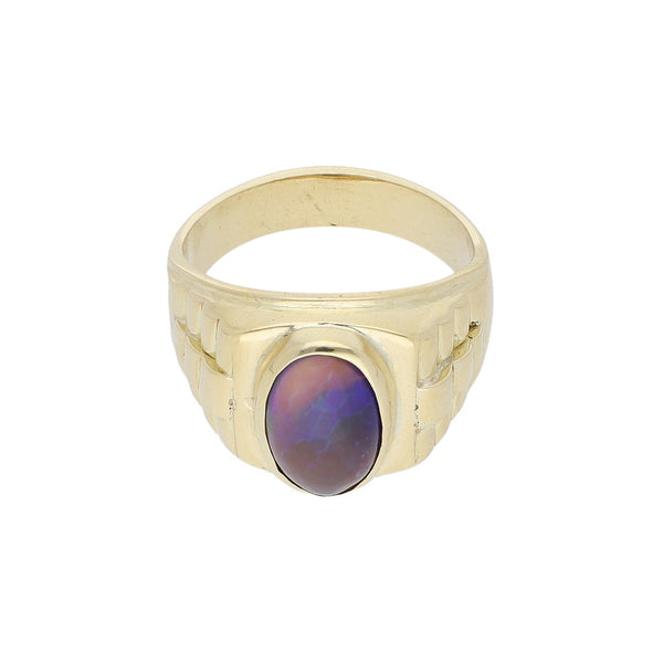 Anillo diseño especial con ópalo en oro amarillo 18 kilates.