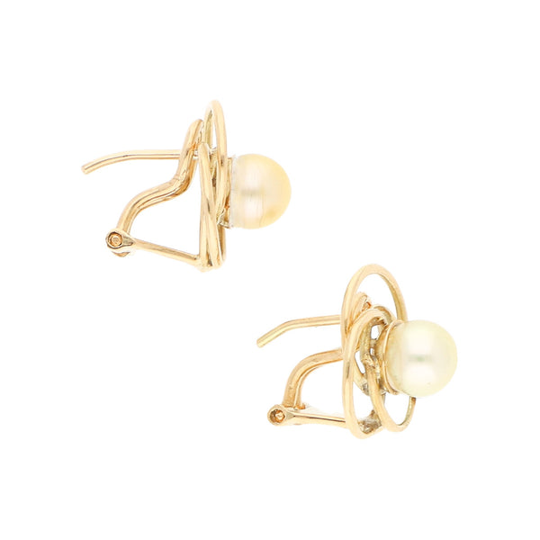 Aretes diseño especial con perlas en oro amarillo 14 kilates.