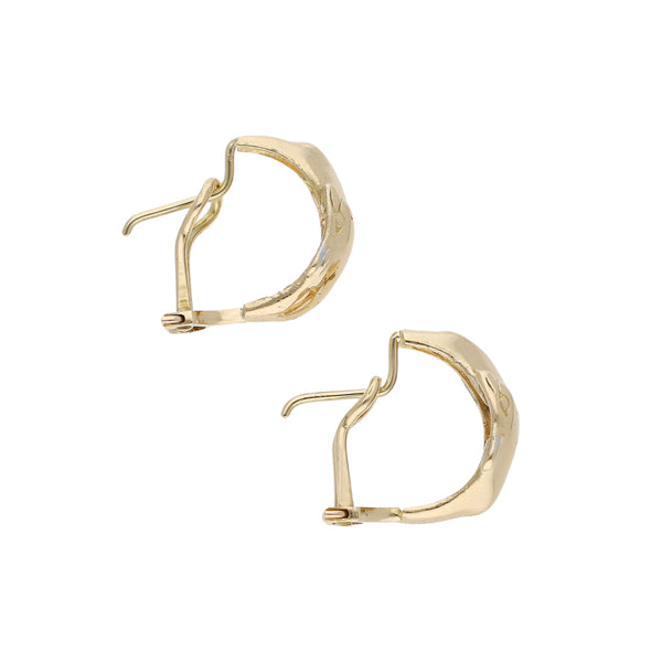 Aretes diseño especial motivo delfin en oro amarillo 14 kilates.