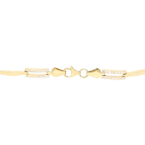 Pulsera eslabón articulado platinado en oro amarillo 14 kilates.