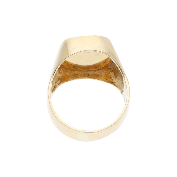 Anillo tipo sello con ónix en oro amarillo 14 kilates.