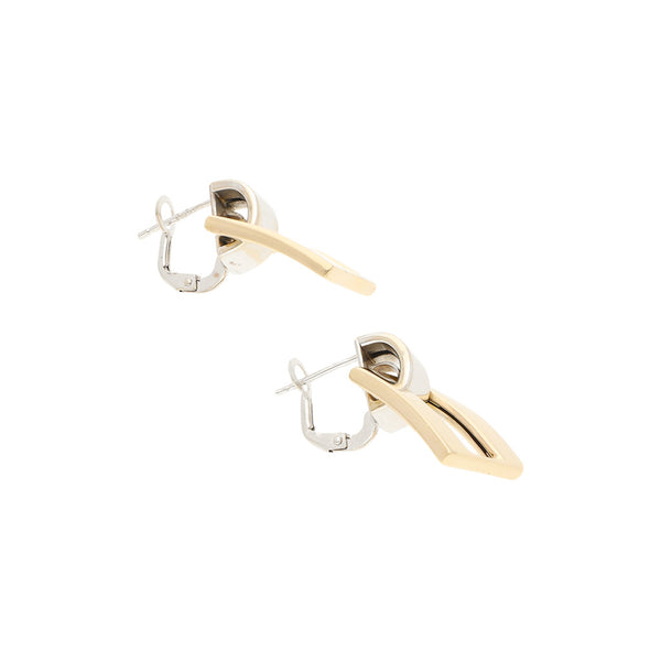 Arete diseño especial en oro dos tonos 14 kilates.