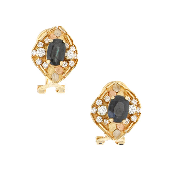 Aretes diseño especial con aplicaciones, zafiros y circonias en oro tres tonos 14 kilates.