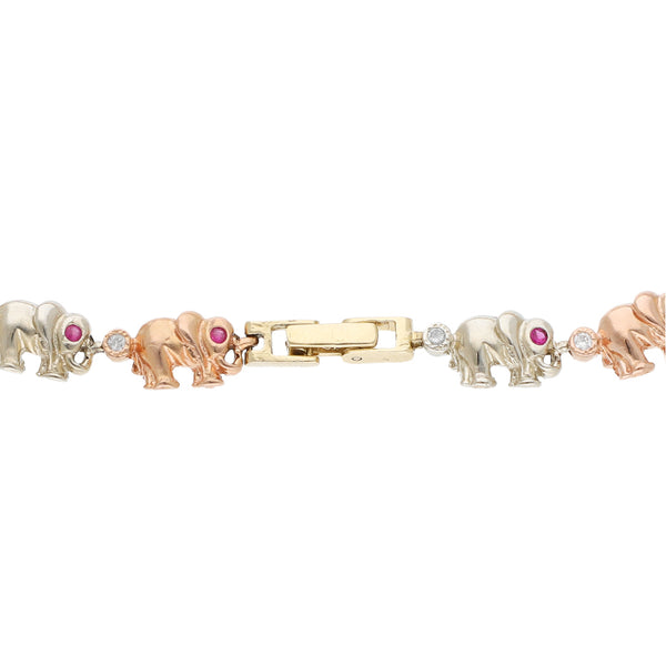 Pulsera eslabón articulado motivo elefantes con sintéticos en oro tres tonos 14 kilates.