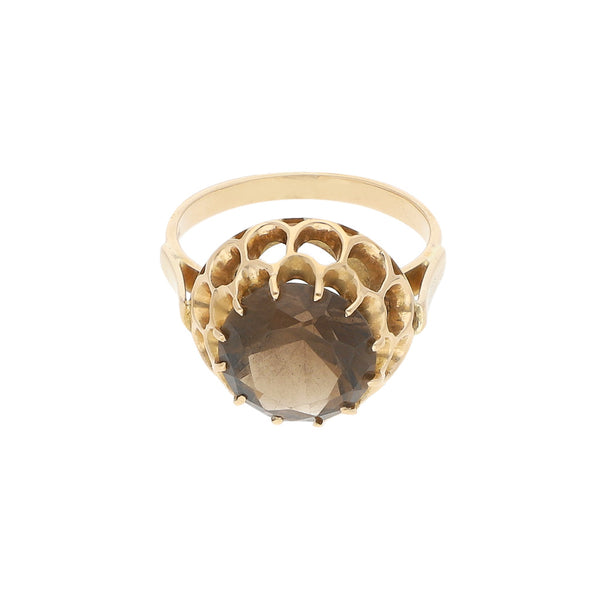 Anillo calado con sintético en oro amarillo 14 kilates.