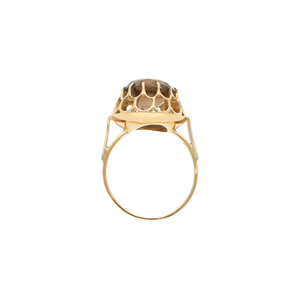 Anillo calado con sintético en oro amarillo 14 kilates.
