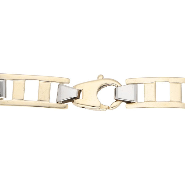 Pulsera eslabón articulado en oro dos tonos 14 kilates.