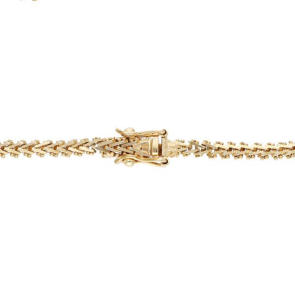 Pulsera eslabón boleado en oro amarillo 14 kilates.