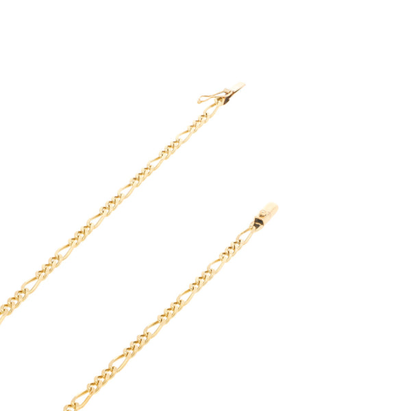 Collar de tres eslabones por uno en oro amarillo 14 kilates.