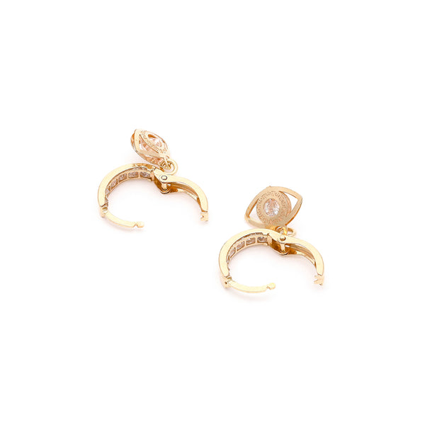 Arracada articulada con sintéticos y colgante motivo ojo en oro amarillo 14 kilates.