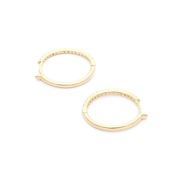 Arracadas articuladas con circonias en oro amarillo 14 kilates.