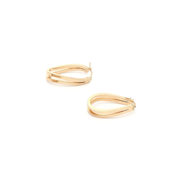 Arracadas huecas en oro amarillo 14 kilates.