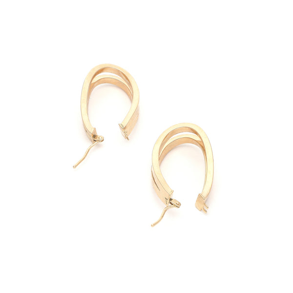 Arracadas huecas en oro amarillo 14 kilates.