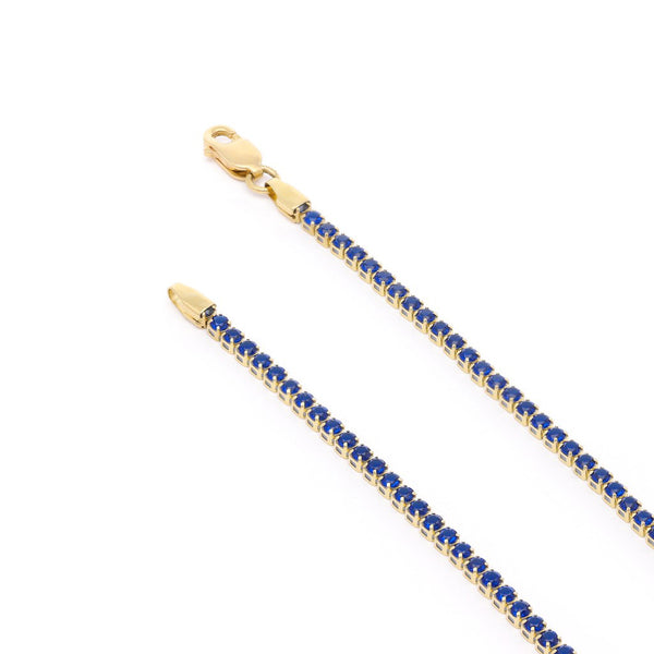 Pulsera eslabón articulado con sintéticos en oro amarillo 14 kilates.