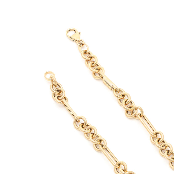Pulsera eslabón combinado en oro amarillo 14 kilates.