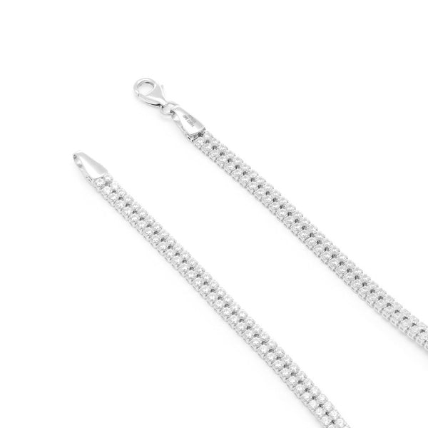 Pulsera eslabón articulado con circonias en oro blanco 14 kilates.