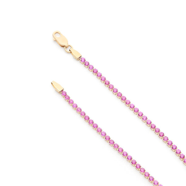 Pulsera eslabón articulado con sintéticos en oro amarillo 14 kilates.