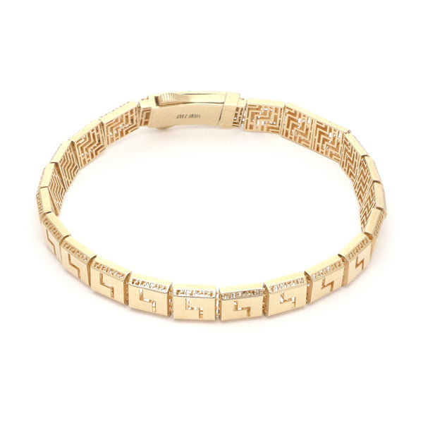 Pulsera eslabón articulado con sintéticos motivo grecas en oro amarillo 14 kilates.