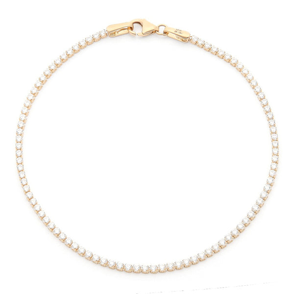 Pulsera eslabón articulado con circonias en oro amarillo 14 kilates.