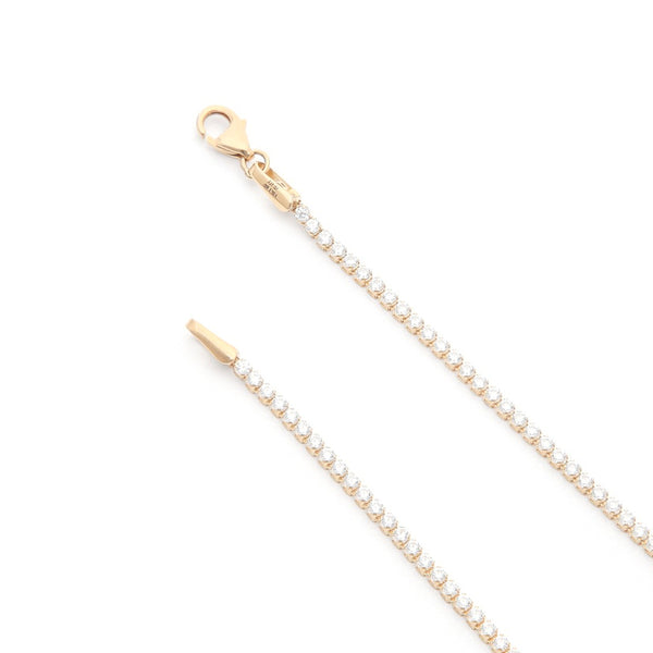 Pulsera eslabón articulado con circonias en oro amarillo 14 kilates.