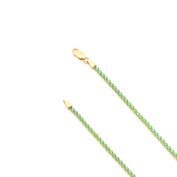 Pulsera eslabón articulado con sintéticos en oro amarillo 14 kilates.