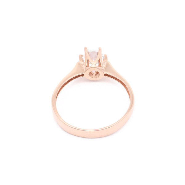 Anillo de compromiso con circonia en oro rosa 14 kilates.