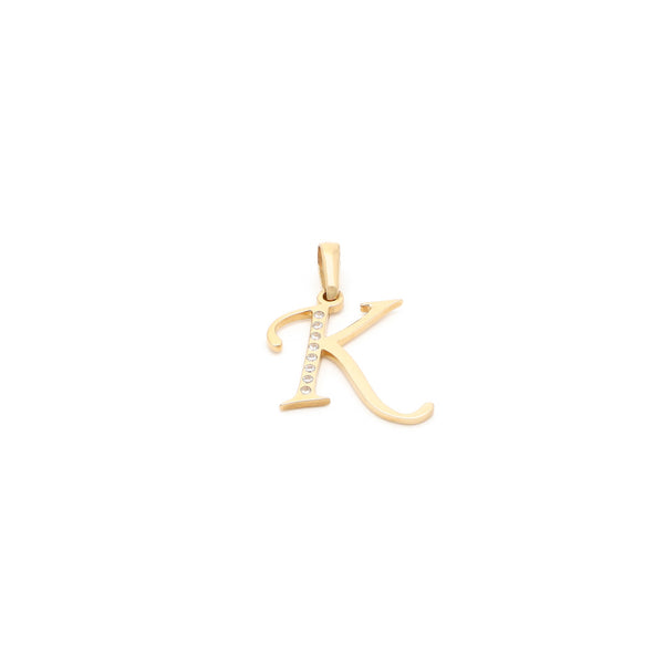 Dije diseño especial motivo letra K con circonias en oro amarillo 14 kilates.