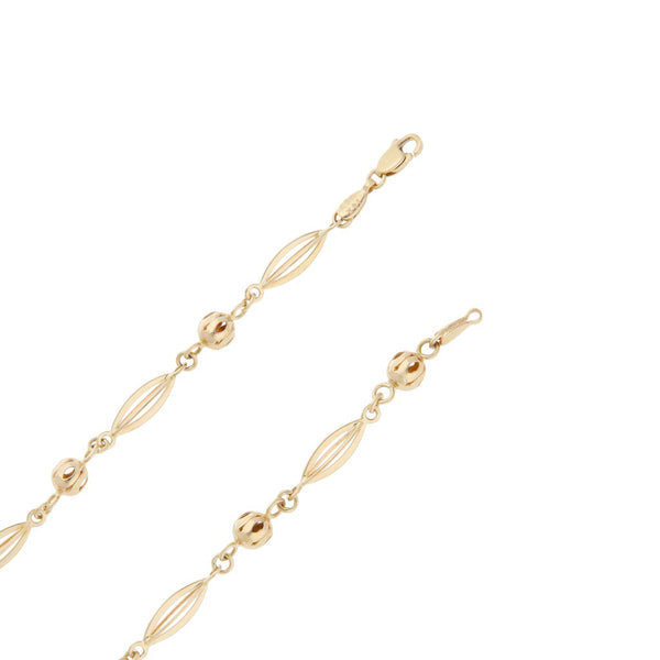 Collar eslabón articulado con aplicaciones en oro amarillo 14 kilates.