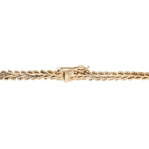 Pulsera eslabón boleado en oro amarillo 14 kilates.