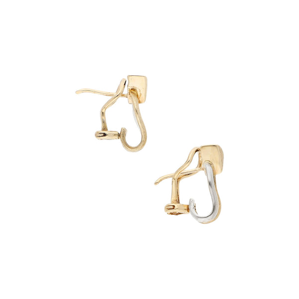 Aretes estilizados en oro dos tonos 14 kilates.