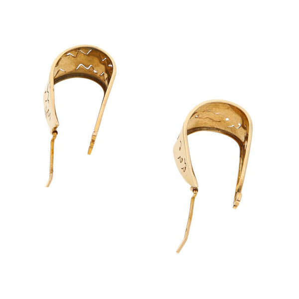 Arracadas estilizadas en oro amarillo 14 kilates.