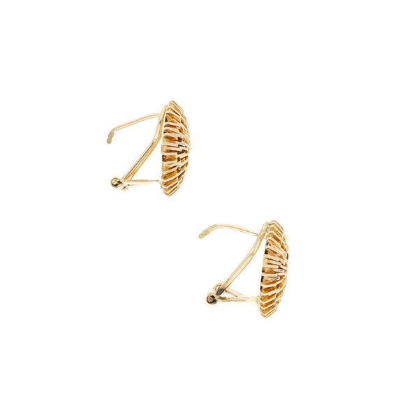 Aretes diseño especial en oro amarillo 14 kilates.