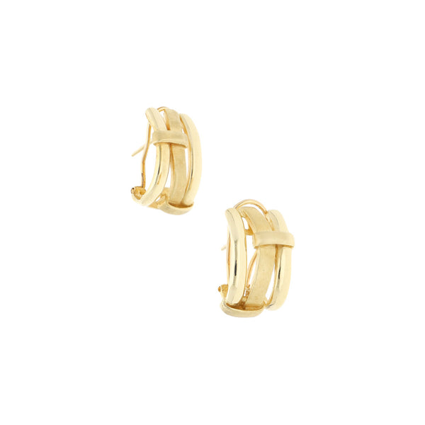 Aretes diseño especial en oro amarillo 14 kilates.