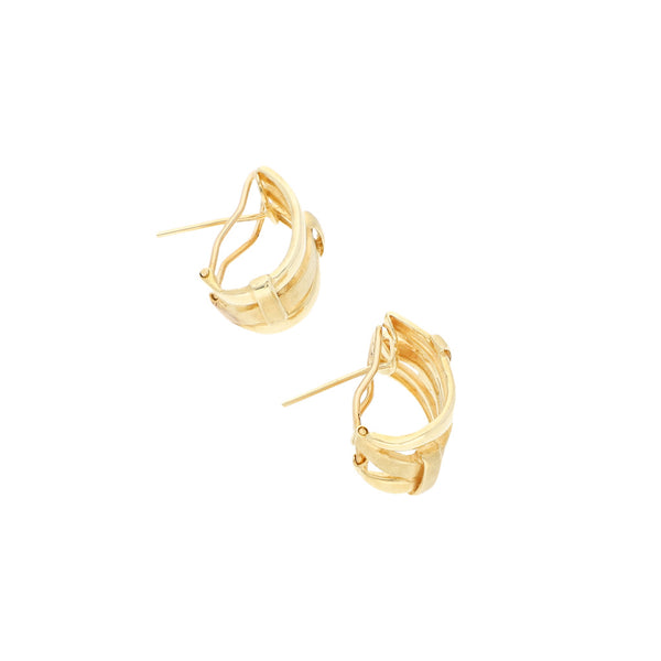 Aretes diseño especial en oro amarillo 14 kilates.