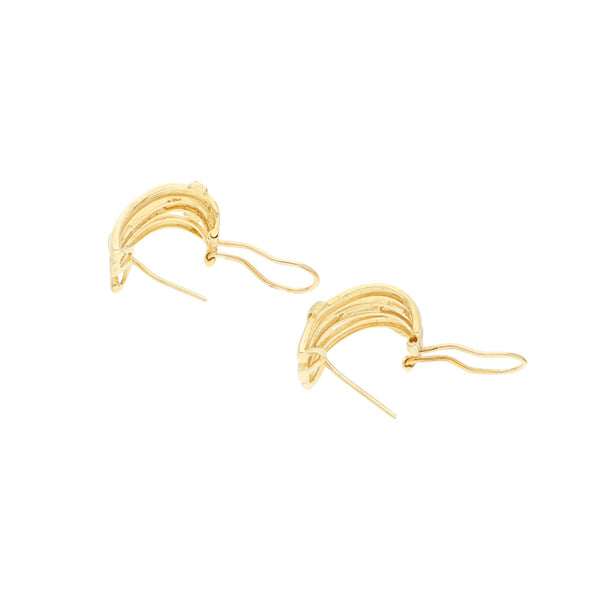 Aretes diseño especial en oro amarillo 14 kilates.