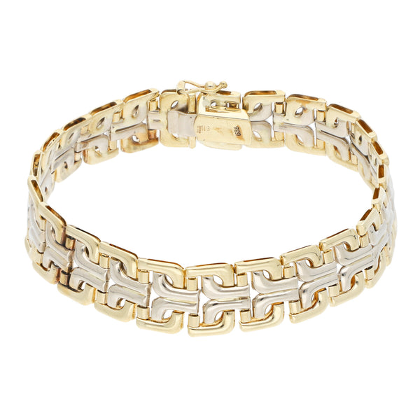 Pulsera articulada en oro dos tonos 14 kilates.
