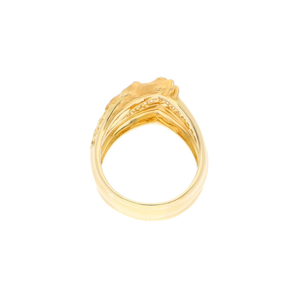 Anillo diseño especial con diamantes y rubí motivo caballo firma Carrera y Carrera en oro amarillo 18 kilates.