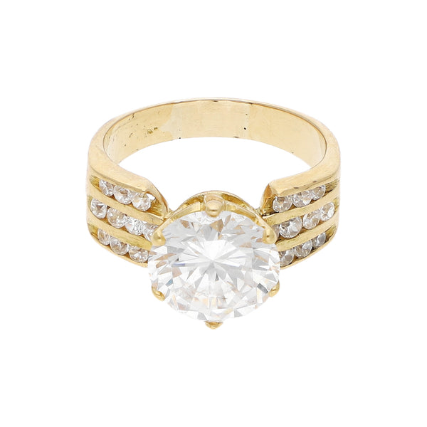 Anillo de compromiso con sintéticos en oro amarillo 18 kilates.