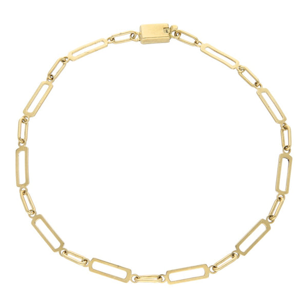 Pulsera eslabón cruzado en oro amarillo 18 kilates.