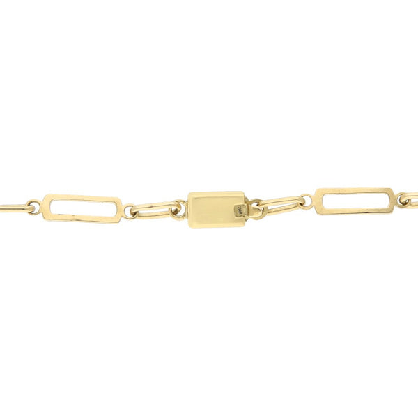 Pulsera eslabón cruzado en oro amarillo 18 kilates.
