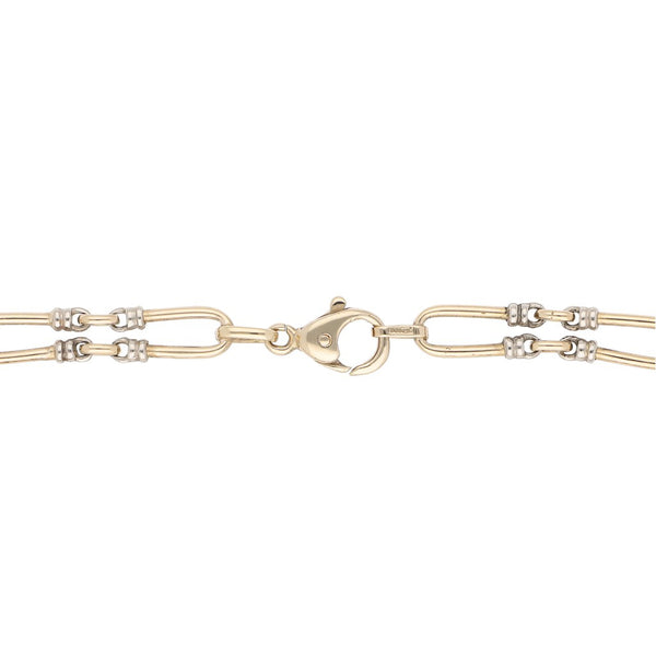 Pulsera eslabón articulado en oro dos tonos 14 kilates.
